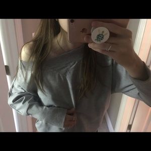 Off the shoulder grey crew neck sweater